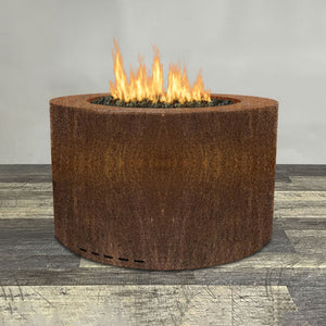 Front view of 36" Round Gravity Corten Steel Fire Pit by Starfire Designs - Brown with flames on, featuring sleek modern design and durable construction, perfect for outdoor patio spaces. Natural gas or propane compatible, enhancing warmth and ambiance. Lava rocks included for added aesthetic.