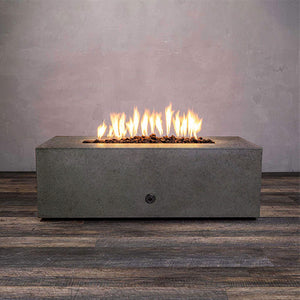 Front view of Starfire Designs Gravity 48" x 32" Rectangle Rustic Gravity Concrete (GFRC) Fire Pit - Propane Gas Hardline - Brown with flames on, featuring sleek modern concrete bowl design and durable construction, perfect for outdoor patio spaces. Natural gas or propane compatible, enhancing warmth and ambiance. Lava rocks included for added aesthetic.