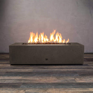 Front view of Starfire Designs Gravity 60" x 32" Rectangle Rustic Gravity Concrete (GFRC) Fire Pit - Propane Gas Hardline - Brown with flames on, featuring sleek modern concrete bowl design and durable construction, perfect for outdoor patio spaces. Natural gas or propane compatible, enhancing warmth and ambiance. Lava rocks included for added aesthetic.
