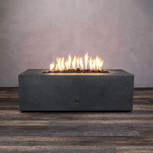 Front view of Starfire Designs Gravity 48" x 32" Rectangle Rustic Gravity Concrete (GFRC) Fire Pit - Propane Gas Hardline - Graphite with flames on, featuring sleek modern concrete bowl design and durable construction, perfect for outdoor patio spaces. Natural gas or propane compatible, enhancing warmth and ambiance. Lava rocks included for added aesthetic.