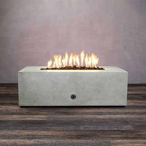 Front view of Starfire Designs Gravity 48" x 32" Rectangle Rustic Gravity Concrete (GFRC) Fire Pit - Propane Gas Hardline - Natural Gray with flames on, featuring sleek modern concrete bowl design and durable construction, perfect for outdoor patio spaces. Natural gas or propane compatible, enhancing warmth and ambiance. Lava rocks included for added aesthetic.