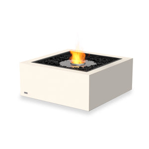 The EcoSmart Fire Base 30 Bone ethanol fire pit features a stainless steel burner embedded within black fire media, creating a clean, contemporary look. Its bone-colored concrete construction offers durability and weather resistance, making it a perfect outdoor fire table for patios, backyards, and modern landscapes.