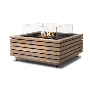 The EcoSmart Fire Base 30 Teak propane fire pit blends modern outdoor fire pit aesthetics with the warmth of propane flames. Crafted from high-quality slatted teakwood, this luxury fire pit features a concealed propane system and black fire media for a sophisticated look. Its sleek, compact design is perfect for patio fire pits or backyard entertainment spaces, delivering a clean and adjustable flame.