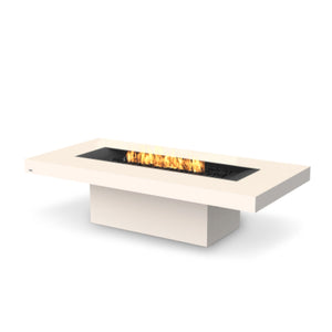 The EcoSmart Fire Gin 90 Chat Height Bone propane-powered fire table features a minimalist bone-colored concrete frame with a rectangular burner pan filled with black fire media. This high-end modern fire pit provides a consistent and adjustable flame, making it perfect for residential patios, commercial rooftops, and backyard gatherings. The propane fire pit table is designed to offer long-lasting performance and easy maintenance.