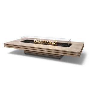 The EcoSmart Fire Gin 90 Low Teak propane fire table combines a modern wood-slat design with a high-performance propane burner and a protective glass wind guard, ensuring a steady flame even in breezy conditions. This luxury outdoor fire pit is an ideal choice for backyards, patios, and commercial spaces, providing warmth and ambiance with premium fire glass accents.