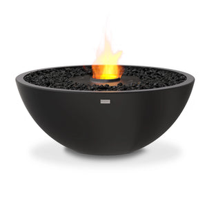 The EcoSmart Fire Mix 850 Graphite Fire Pit boasts a dark graphite-colored concrete design, featuring a black burner with fire glass for an elegant contrast. This bioethanol fire pit is a perfect choice for upscale patios, modern outdoor living spaces, and commercial fire pit installations.
