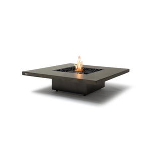 The EcoSmart Fire Vertigo 40 in natural concrete finish with a black burner, showcasing its sleek square design and elegant modern aesthetic. This contemporary fire pit table is perfect for luxury outdoor patios, backyard gatherings, and modern fire feature installations. Designed for natural gas or propane, it enhances any stylish outdoor setting with a warm and inviting ambiance.
