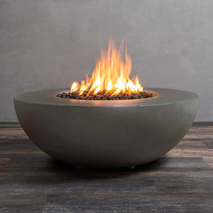 Front view of the Starfire Designs Gravity 45-inch round concrete gas fire pit in brown with flames. This outdoor fire pit features a smooth, curved design and a powerful flame, perfect for enhancing any backyard or patio setting. Durable concrete construction with brown finish and a high-performance gas burner