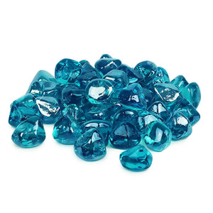 A pile of Starfire Glass Reflective Fire Diamonds in Azuria Blue, featuring smooth, gem-like fire media with a deep blue hue. These high-quality fire pit glass diamonds add an elegant sparkle, enhancing any modern fire pit or outdoor fire table with their heat-resistant, durable design.
