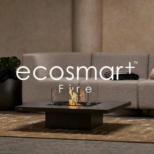 EcoSmart Fire's sleek square fire table in modern black finish, placed in a contemporary living room. Designed for luxury ambiance, this eco-friendly fireplace enhances indoor and outdoor spaces.