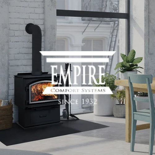 Empire Comfort Systems wood stove showcased in a modern, light-filled living space with large windows, offering efficient heating and timeless design for cozy home ambiance and practical functionality.