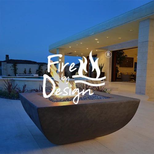 Fire by Design modern fire pit in a sleek concrete finish, featuring vibrant flames over decorative fire glass, creating an elegant centerpiece for luxurious outdoor living spaces at dusk.