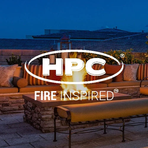 HPC Fire Inspired outdoor fire pit with a rustic stone base, vibrant flames, and cozy seating area, ideal for luxury backyard designs and high-quality gas fire pit outdoor heating solutions.