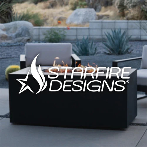 Starfire Designs rectangular fire pit table in sleek black finish, set in a modern outdoor patio with desert landscaping. This luxury fire pit enhances backyard gatherings with warmth and contemporary style.