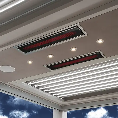 a pair of electric patio heaters by Bromic are flush installed in to a stunning modern patio outdoor room and heating the entire area