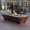 Large 10ft Copper Spartan Gas Fire Pit by Starfire Designs in a commercial setting, ideal for upscale outdoor spaces with a hammered copper finish