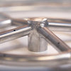 Detailed close-up of the 18-inch pan and 12-inch ring round stainless steel fire pit burner hub by Starfire Designs. Precision-welded connections ensure efficient gas flow and longevity, making this burner an excellent choice for outdoor fire pits