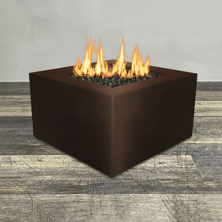 Front view of 36" Square Gravity Powder Coated Steel Fire Pit - Propane Gas Hardline - Flame Sense with Spark Ignition System - Bronze Hammertone by Starfire Designs - Brown with flames on, featuring sleek modern concrete design and durable construction, perfect for outdoor patio spaces. Natural gas or propane compatible, enhancing warmth and ambiance. Lava rocks included for added aesthetic.