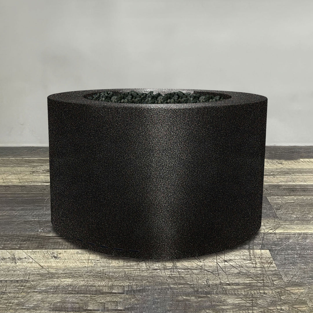 A side view of the 36" Round Gravity Powder Coated Steel Fire Pit - Natural Gas - Match Lit - Silver Vein by Starfire Designs - perfect for outdoor patio spaces. Natural gas or propane compatible, enhancing warmth and ambiance. Lava rocks included for added aesthetic.