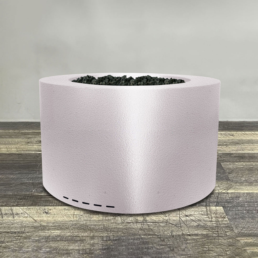 A side view of the 36" Round Gravity Powder Coated Steel Fire Pit - Natural Gas - 110V CSA On/Off Electronic Ignition System - White Hammertone by Starfire Designs - perfect for outdoor patio spaces. Natural gas or propane compatible, enhancing warmth and ambiance. Lava rocks included for added aesthetic.