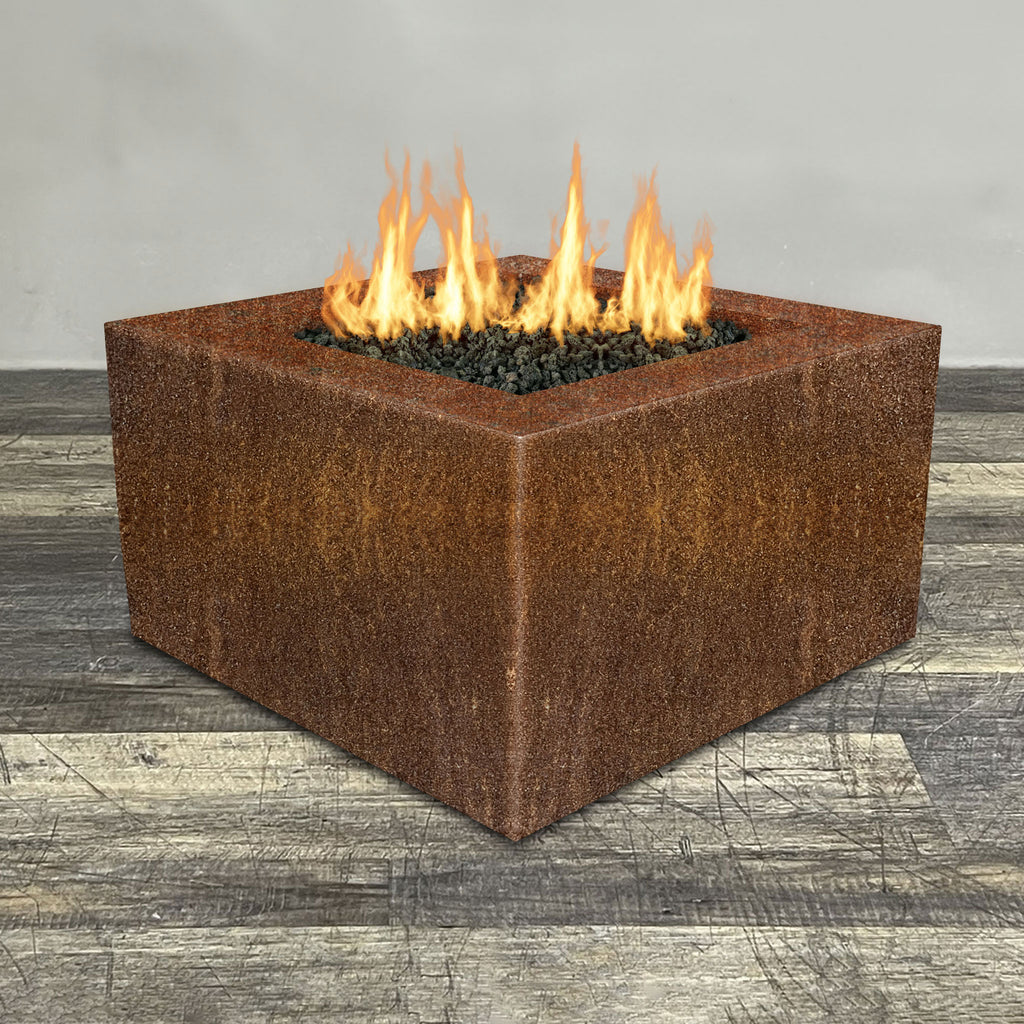 Front view of 45" Square Gravity Corten Steel Fire Pit by Starfire Designs - Brown with flames on, featuring sleek modern  design and durable construction, perfect for outdoor patio spaces. Natural gas or propane compatible, enhancing warmth and ambiance. Lava rocks included for added aesthetic.