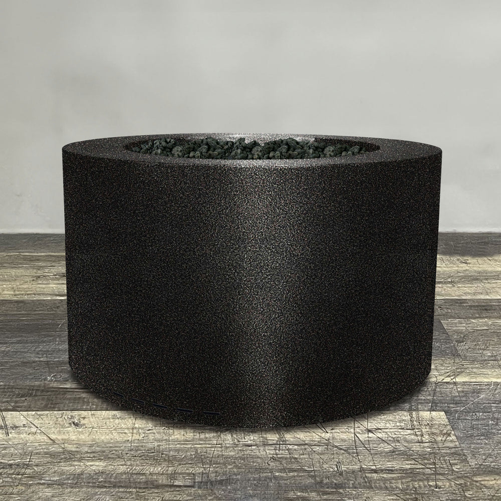 A side view of the 45" Round Gravity Powder Coated Steel Fire Pit - Natural Gas - 110V CSA Hi/Lo Electronic Ignition System w/Bluetooth & Handheld Remote - Silver Vein by Starfire Designs - perfect for outdoor patio spaces. Natural gas or propane compatible, enhancing warmth and ambiance. Lava rocks included for added aesthetic.