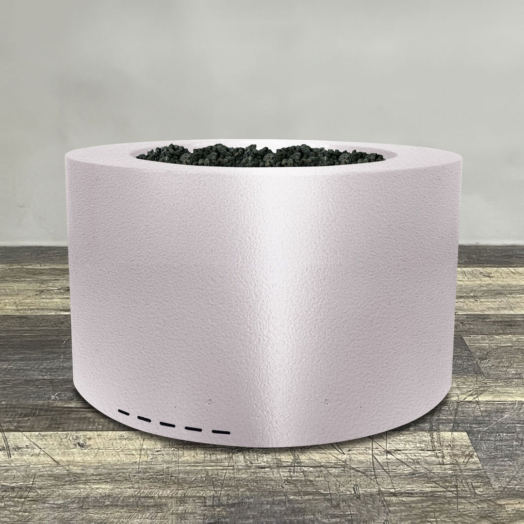 A side view of the 45" Round Gravity Powder Coated Steel Fire Pit - Natural Gas - 110V CSA Hi/Lo Electronic Ignition System w/Bluetooth & Handheld Remote - White Hammertone by Starfire Designs - perfect for outdoor patio spaces. Natural gas or propane compatible, enhancing warmth and ambiance. Lava rocks included for added aesthetic.