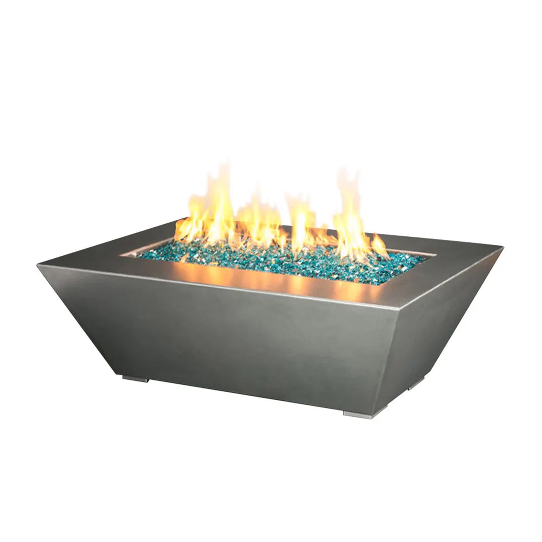 Rectangular fire pit with a modern stainless steel design, featuring a 48-inch length, 32-inch width, and 18-inch height, filled with turquoise fire glass and emitting a bright, warming flame