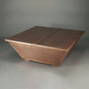 48 x 48-inch square copper tabletop featuring a hammered copper finish with a protective lid, perfect for outdoor fire pits or large backyard setups. This durable copper tabletop is ideal for both residential and commercial fire pit tables, offering a luxurious and rustic aesthetic to outdoor fire bowls and patio fire pit setups. The natural copper material ensures longevity and weather resistance