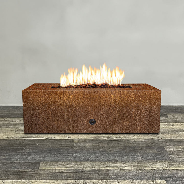 Front view of 48" x 24" Rectangle Gravity Corten Steel Fire Pit by Starfire Designs - Brown with flames on, featuring sleek modern  design and durable construction, perfect for outdoor patio spaces. Natural gas or propane compatible, enhancing warmth and ambiance. Lava rocks included for added aesthetic.
