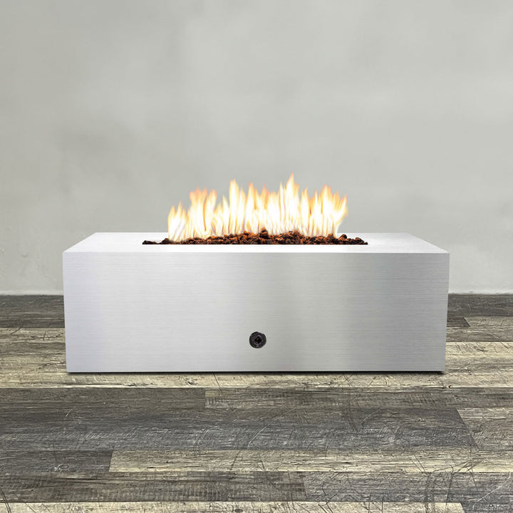 Front view of 48" x 24" Rectangle Gravity Stainless Steel Fire Pit by Starfire Designs - Brown with flames on, featuring sleek modern  design and durable construction, perfect for outdoor patio spaces. Natural gas or propane compatible, enhancing warmth and ambiance. Lava rocks included for added aesthetic.