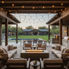 A covered rustic patio features a brown outdoor fire pit surrounded by armchairs and sofas. The setting overlooks a farmhouse lawn and swimming pool at twilight, with string lights adding to the ambiance. The warm glow of the fire table creates a cozy backyard fire pit atmosphere, utilizing a gas fire pit connection for convenience.