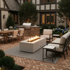 A charming brick courtyard features a white patio fire pit surrounded by cushioned seating and an outdoor dining area. The setting includes an outdoor kitchen and fireplace, creating a complete outdoor entertaining space. The steady flames of the propane fire pit provide warmth and ambiance, enhancing the cozy backyard fire pit atmosphere in a traditional garden setting.