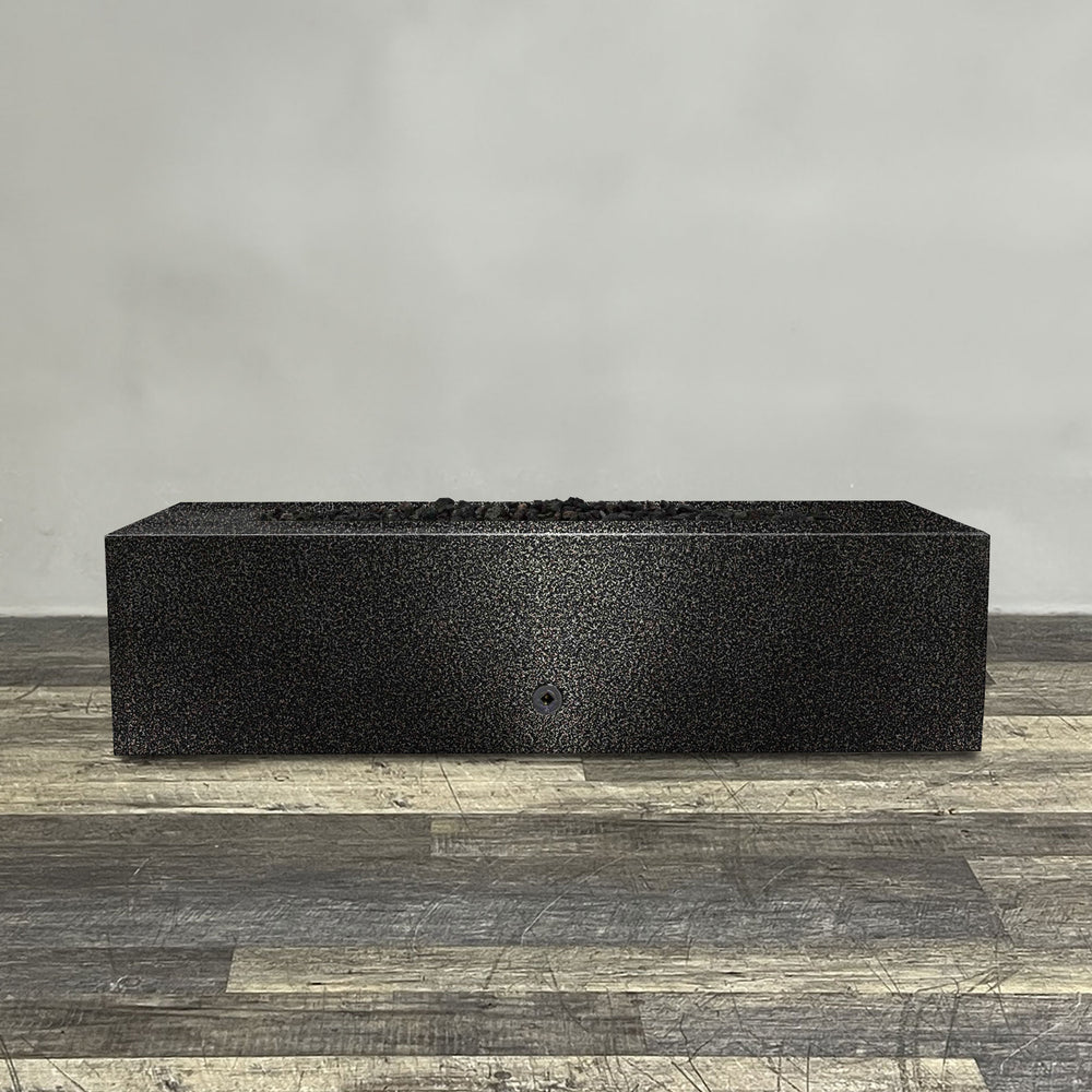 A side view of the 60" x 32" Rectangle Gravity Powder Coated Steel Fire Pit - Propane Gas Hardline - Push Button Spark Ignition - Silver Vein by Starfire Designs - perfect for outdoor patio spaces. Natural gas or propane compatible, enhancing warmth and ambiance. Lava rocks included for added aesthetic.