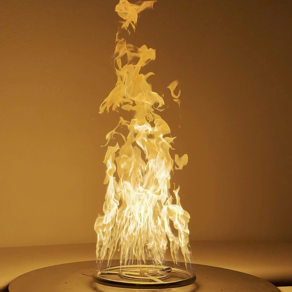 Athena Fire Glass 12-Inch Fire Ring Burner in action, displaying tall, vibrant flames that showcase the burner's superior airflow and efficient combustion design for premium fire feature installations.