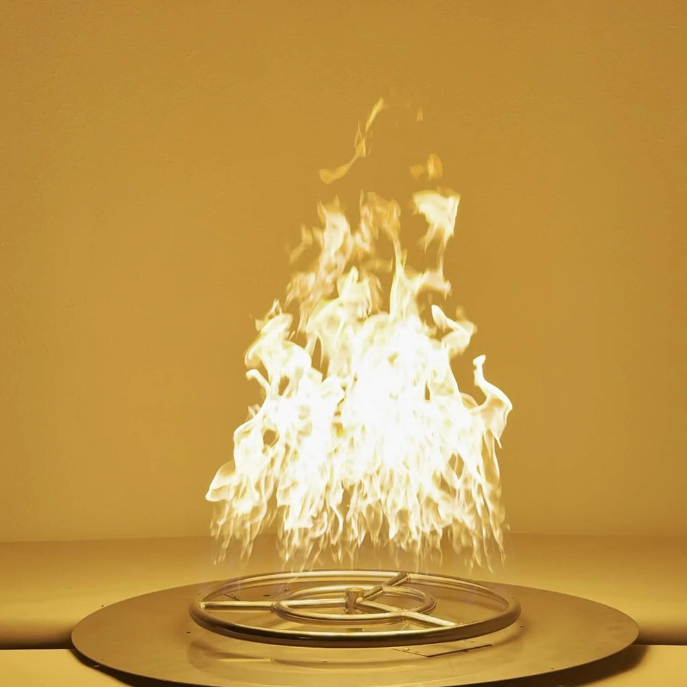 Close-up of the 18-Inch Athena Fire Glass Fire Ring Burner generating a steady, bright flame pattern, perfect for outdoor gas fire pits and custom fire features.