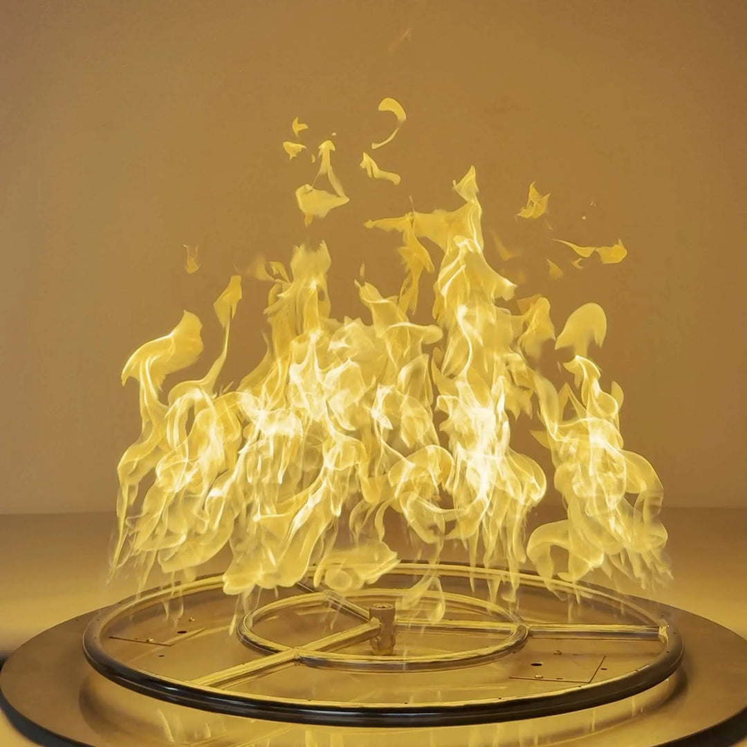 The 24-Inch Athena Fire Glass Fire Ring Burner in action, displaying bright, steady flames across its durable stainless steel rings for outdoor gas fire pit use.