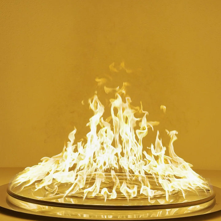 The Athena Fire Glass 36-Inch Stainless Steel Fire Ring Burner showcasing strong, vibrant yellow flames in a controlled circular pattern. Perfect visual of high-performance output designed for propane or natural gas fire features.