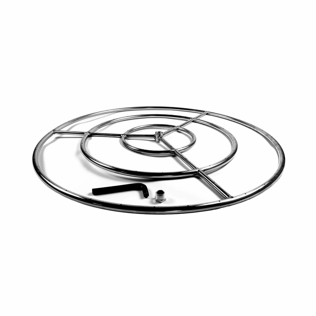 Angled shot of the Athena Fire Glass 36-Inch Fire Ring Burner, shown with included installation tool and gas reducer fitting. Highlights the practical setup components that come with the burner kit.