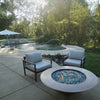  Cono Moreno 48-inch Round Copper Fire Pit in a serene backyard oasis, offering a luxurious outdoor living experience