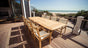 Gala Outdoor Dining Table with Captiva Chairs on the beach