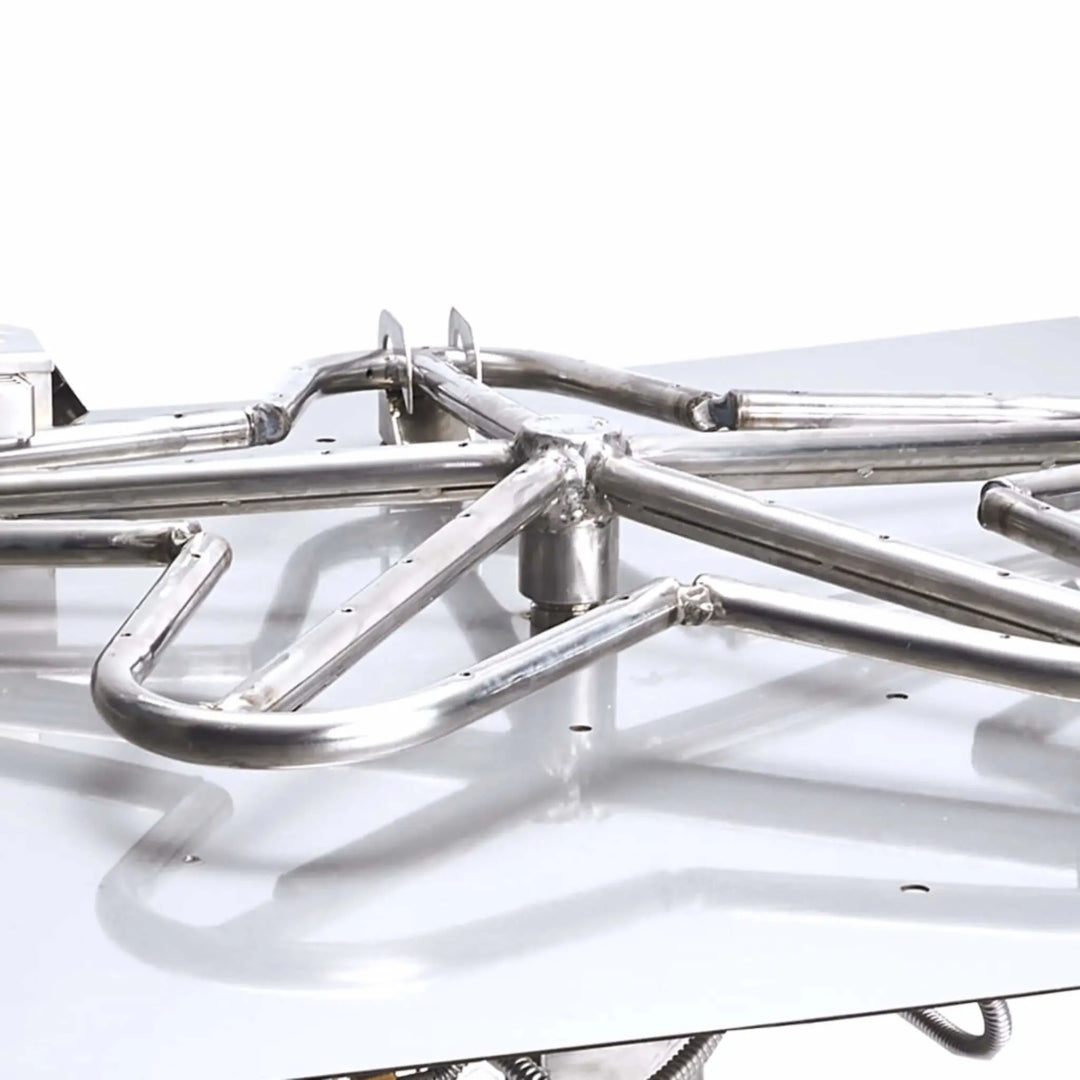 Close-up view of the precision-welded Penta-shaped stainless steel burner by HPC Fire, showcasing the clean craftsmanship and flame port details that provide a tall, natural-looking flame pattern.