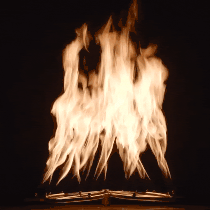 Close-up view of a powerful, bright flame produced by an HPC SST Torpedo Burner, showcasing tall, concentrated fire with dramatic movement / perfect for fire pits seeking intense heat and mesmerizing visual appeal.