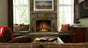 Real Fyre Gas Logs in Stone Livingroom Fireplace