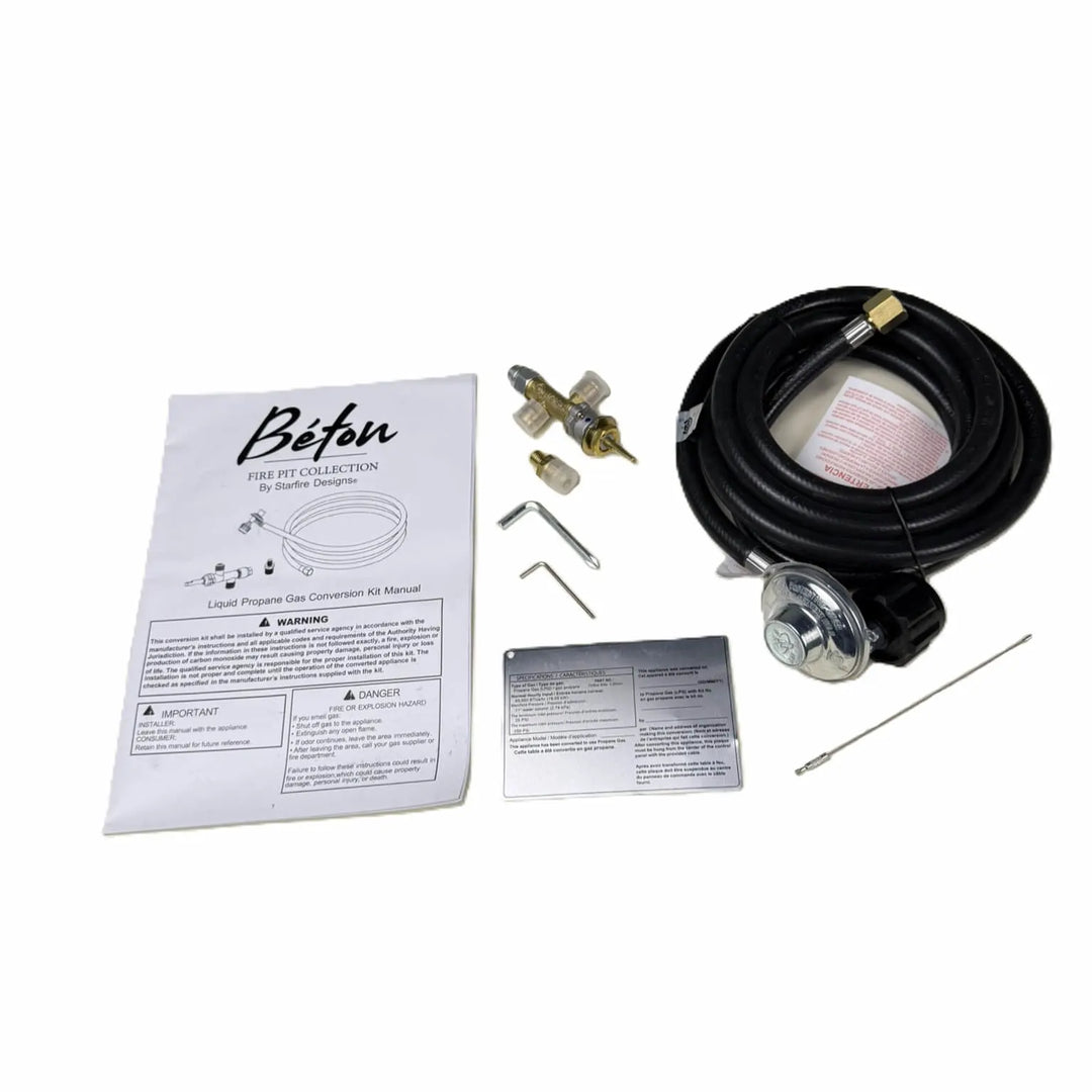 Complete Béton Fire Pit Natural Gas to Propane Conversion Kit by Starfire Designs featuring regulator hose, brass fittings, tools, and instruction manual.