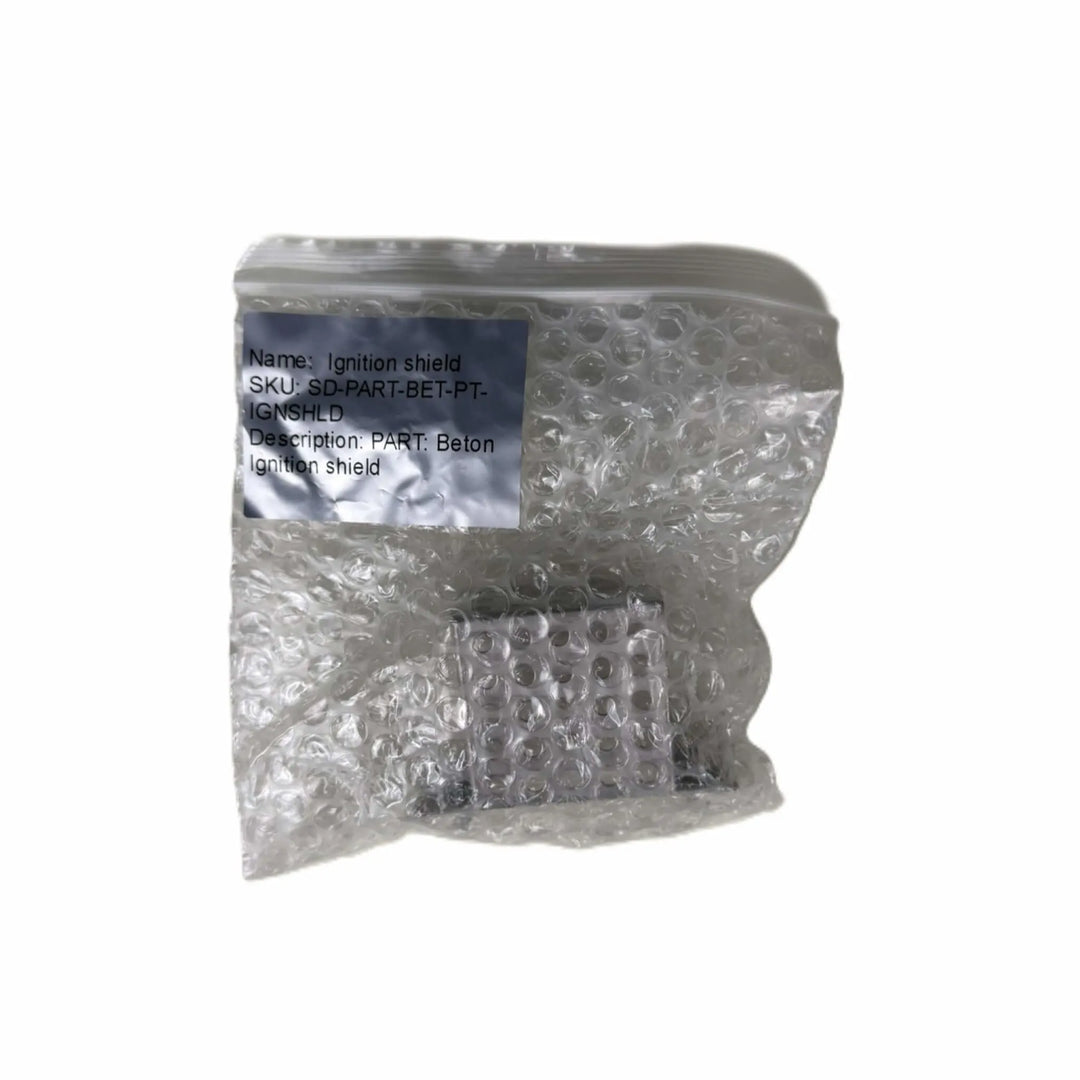 Starfire Designs Béton Fire Pit Replacement Ignition Shield packaged securely in bubble wrap, labeled for easy identification and safe handling.