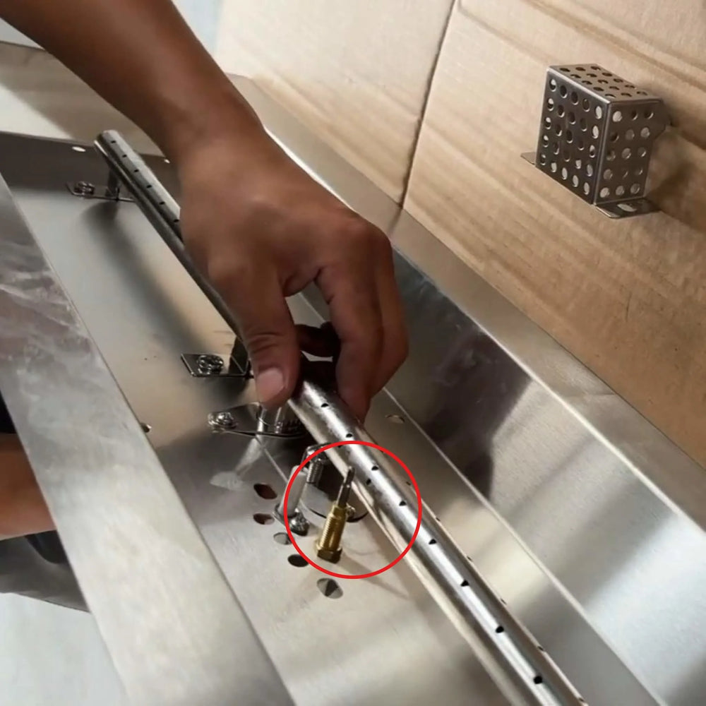 Starfire Designs Béton Fire Pit Replacement Thermocouple Wire installed near the burner assembly, demonstrating its proper placement for pilot safety detection.