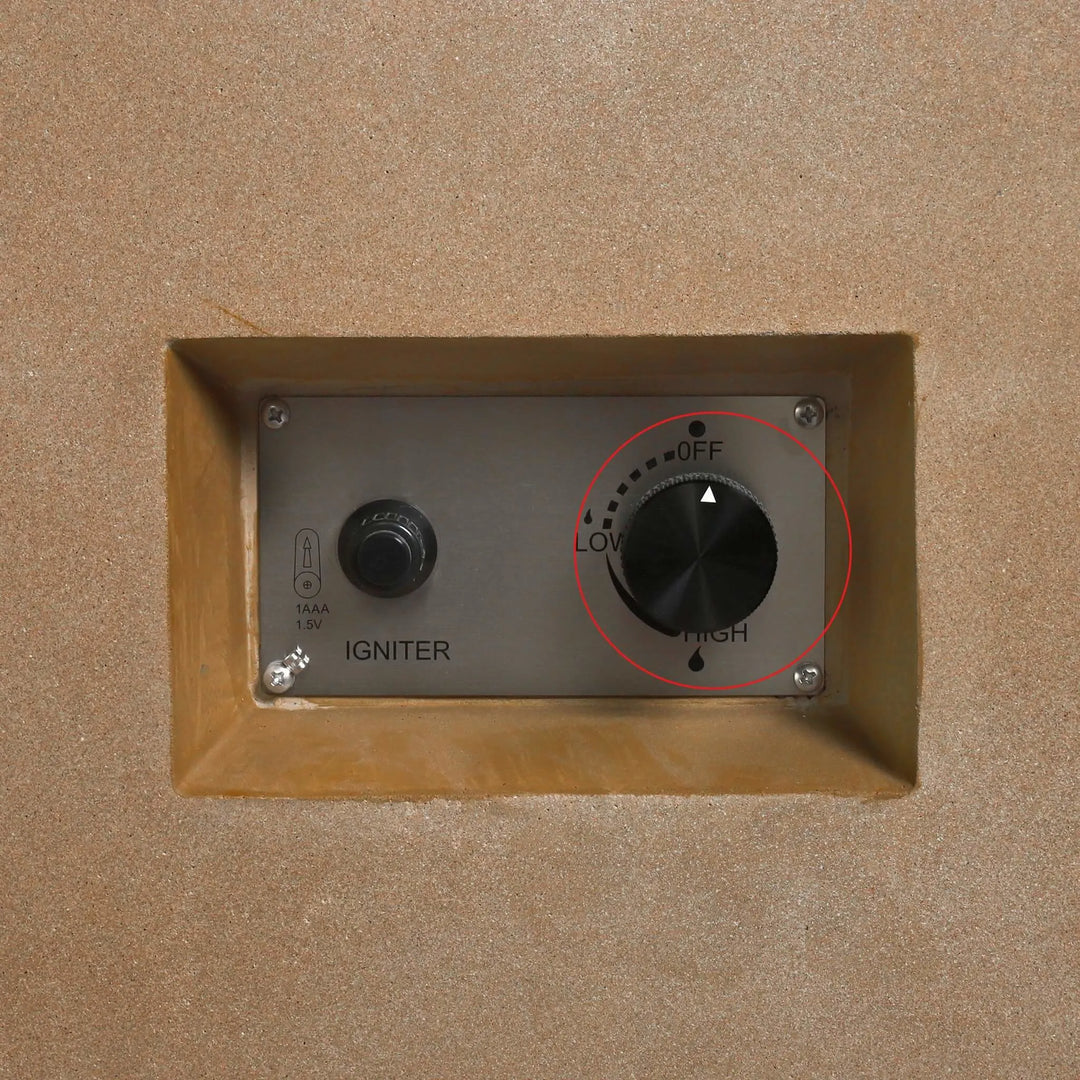 Installed Starfire Designs Béton Fire Pit Replacement Valve Knob displayed on a stainless steel control panel with ignition switch, highlighted to show the knob’s “Off,” “Low,” and “High” flame settings.