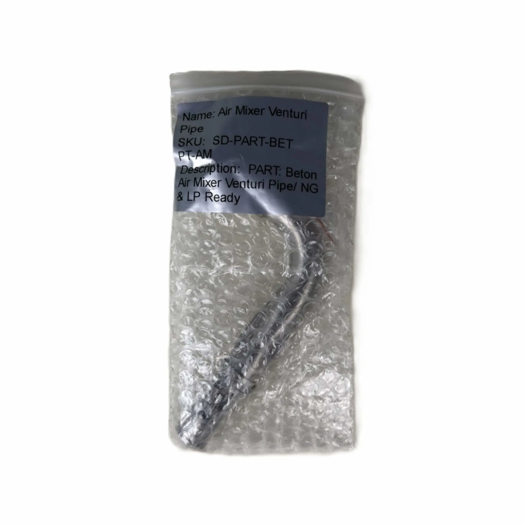 Starfire Designs Béton Fire Pit Venturi Pipe packaged in protective bubble wrap, labeled as ready for both propane and natural gas use.