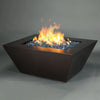 Full view of Steel Mill 48-inch by 32-inch Rectangle Gas Fire Pit in copper vein finish with dancing flames, accentuated by reflective blue fire glass